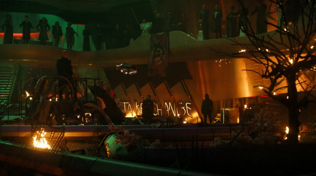 the Academy atrium, graffitied and burning