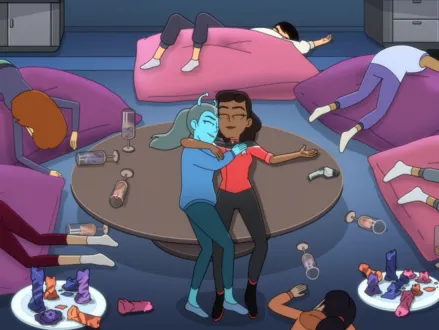 Jennifer and Mariner embracing while unconscious on a table with several other unconscious people in the room