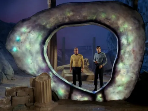 Kirk and Spock standing behind an approximately 12-foot, roughly-circular portal