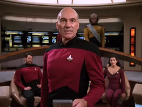 Picard on the bridge, reciting paragraphs from a treaty on a PADD in his hand