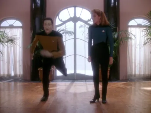 Crusher teaching Data to tap dance in a traditional studio