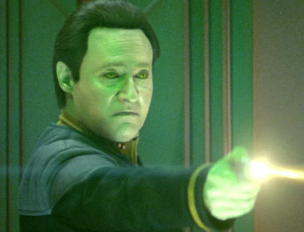 Data firing a phaser into the thalaron generator