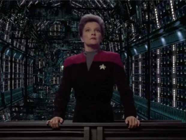 Janeway standing on a Borg ship