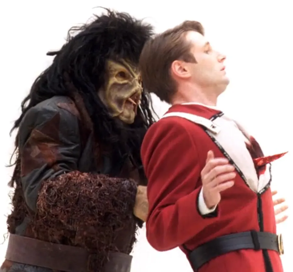 A young Picard being stabbed through the heart by a Nausicaan