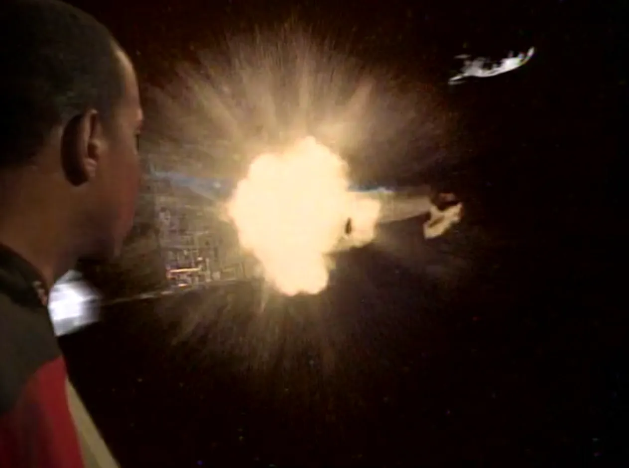 Sisko witnessing the destruction of his ship at the hands of the Borg