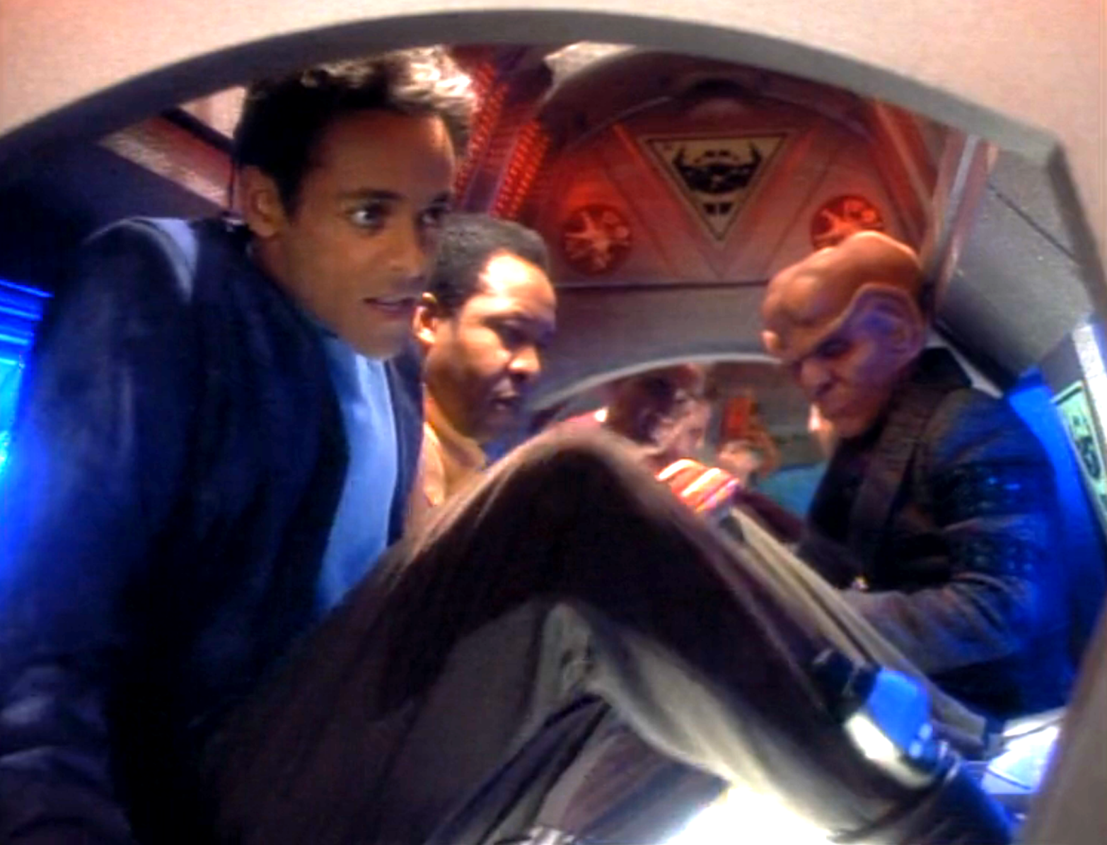 Bashir, Quark, and others in a cramped maintenance tube