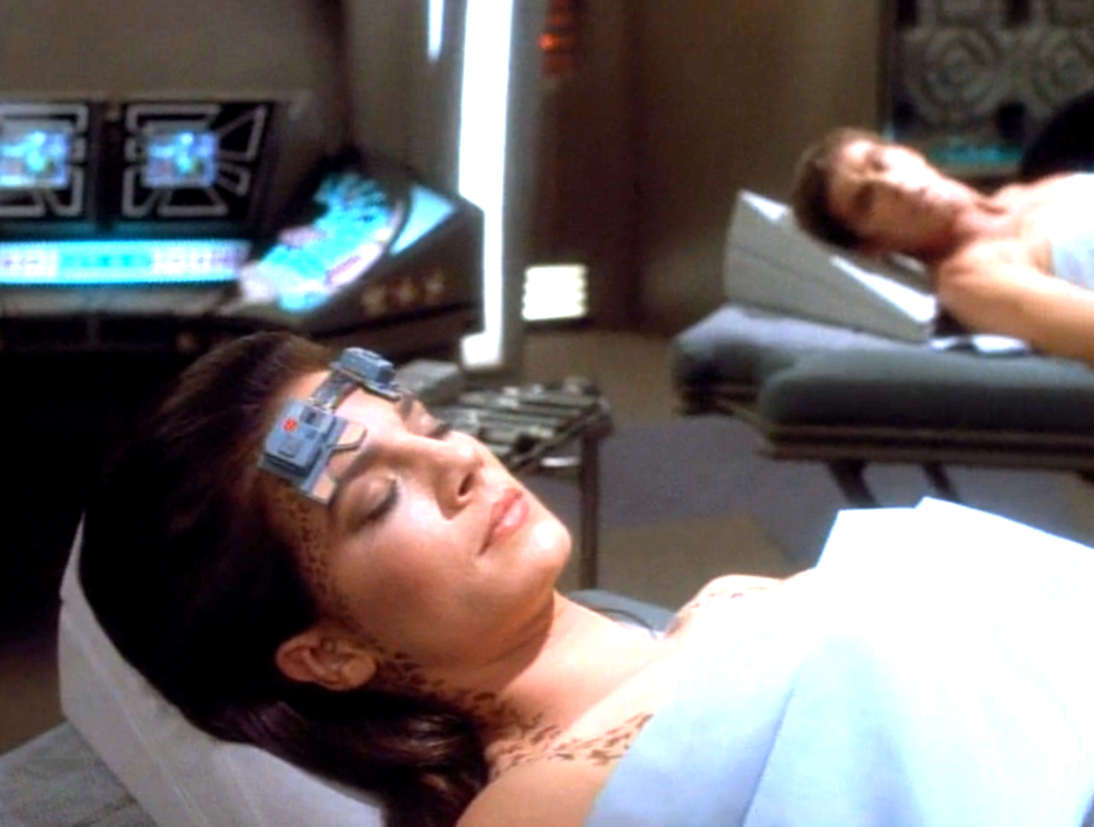 Jadzia Dax and another Trill in sickbay awaiting surgery