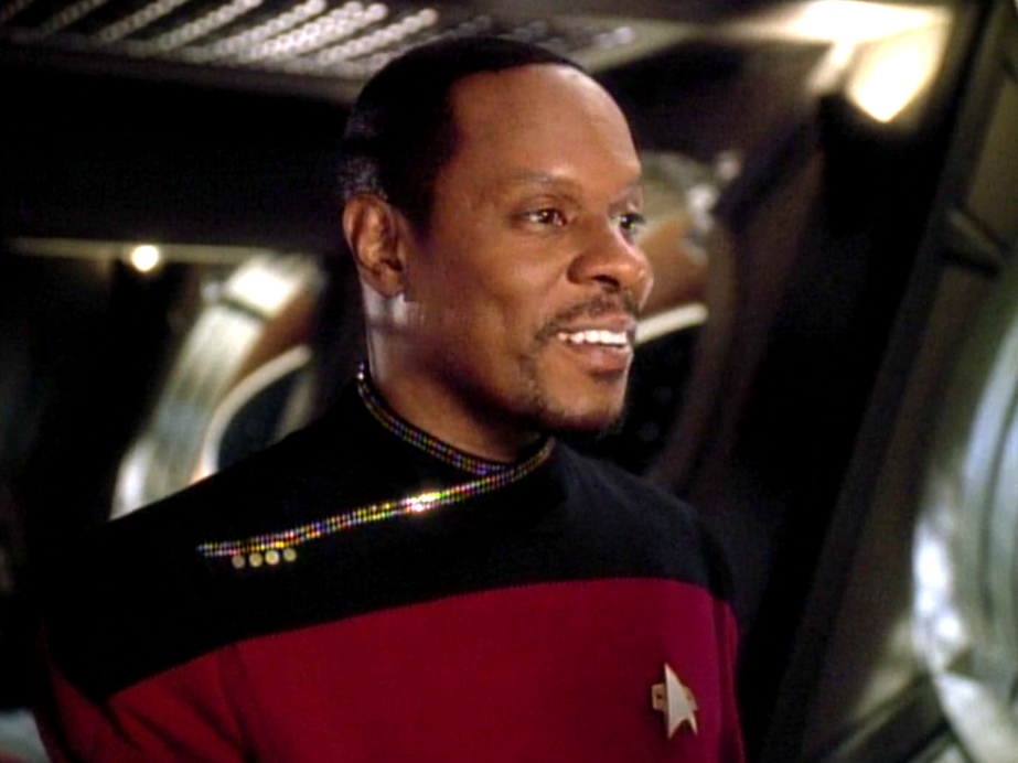 Sisko smiling in his Captain's dress uniform