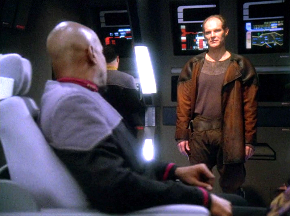 Sisko and Eddington staring each other down