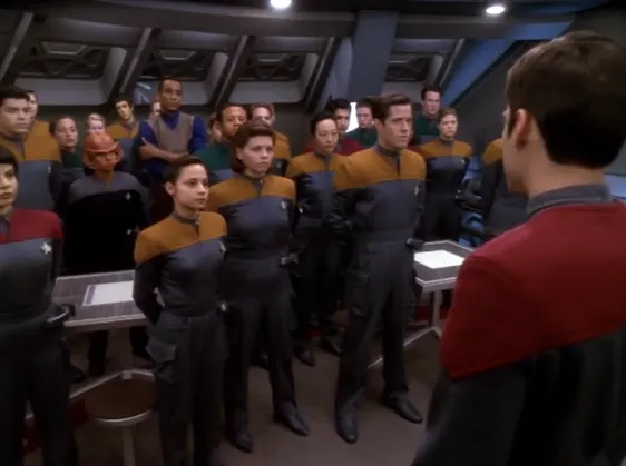 Nog, Jake, and a group of cadets being briefed