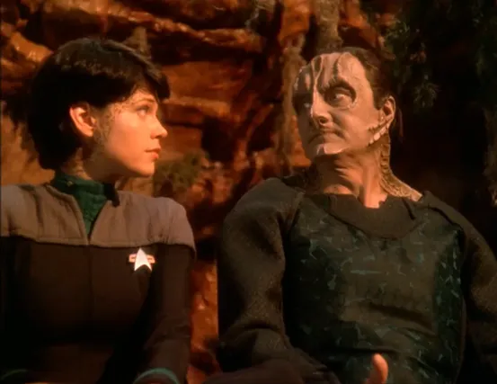 Ezri and Garak looking at each other