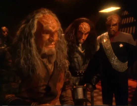 Worf and Martok listening to Kor tell a story