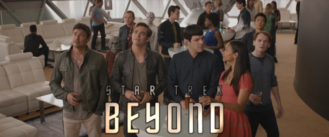 The crew of the Enterprise in plainclothes, enjoying drinks in a lounge