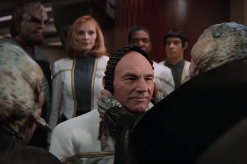 Picard receiving a ceremonial beaded headdress
