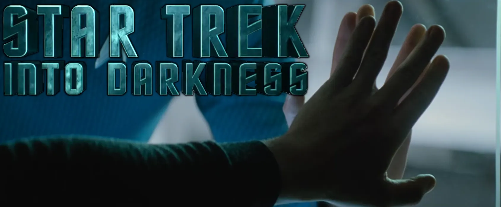 Two people touching hands in the shape of the Vulcan salute with a glass barrier in between them