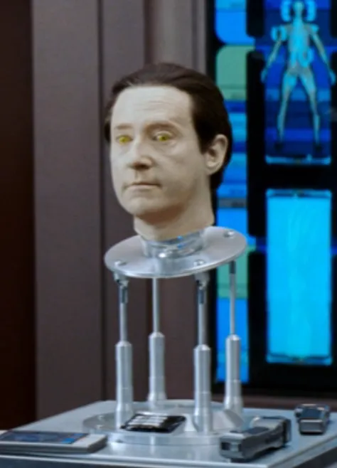 A picture of B-4's head sitting on a pedestal
