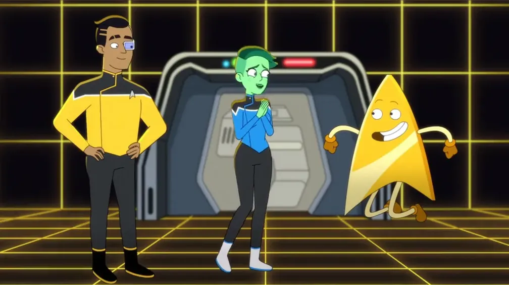 Rutherford and Tendi on the holodeck with a smiling character shaped like a Starfleet delta combadge