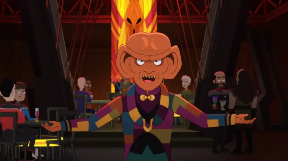 Quark holding his arms open welcomingly at his bar on Deep Space Nine