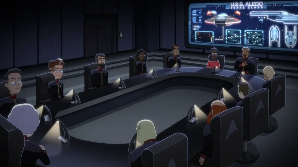 Freeman and numerous Starfleet admirals at an oval desk in a darkened conference room
