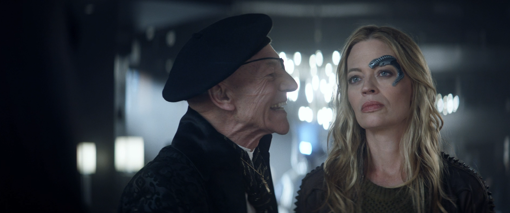 Picard, with an eye patch and beret, speaking with disgust about Seven of Nine