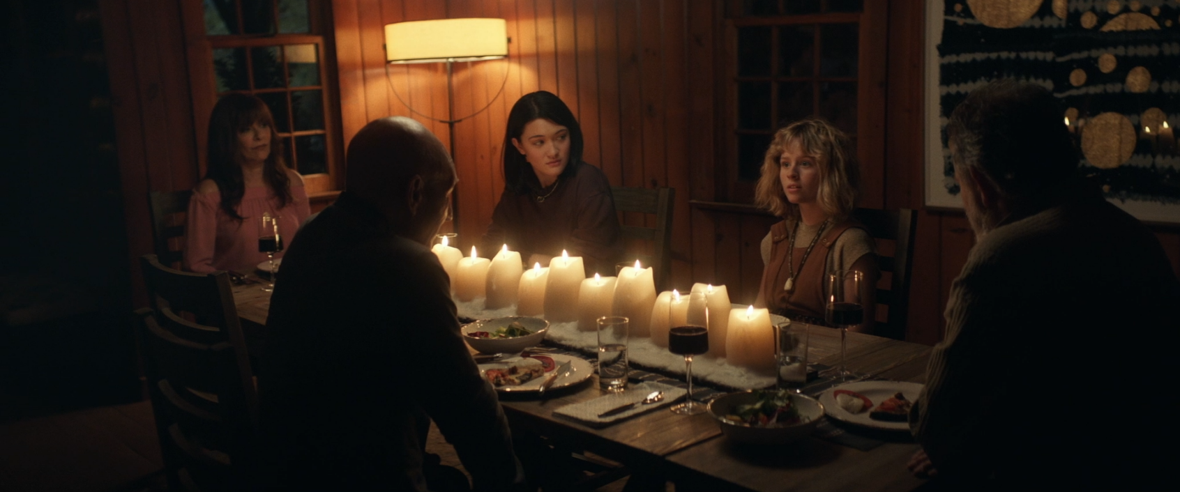 Picard, Soji, Kestra, Riker, and Troi, sitting around a candle-lit dinner table