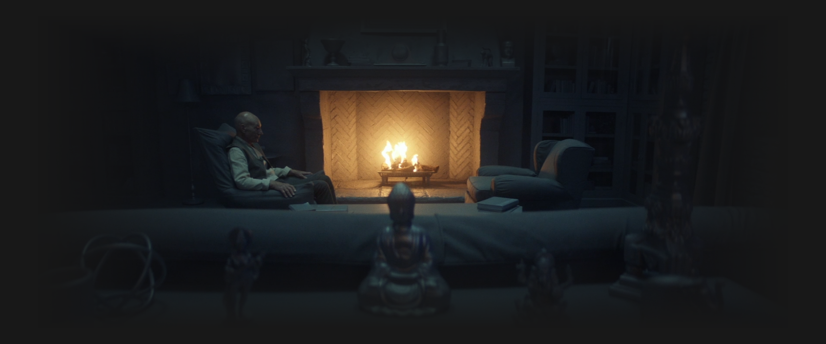 Picard, sitting alone in his study, with a dark grey pall over everything
