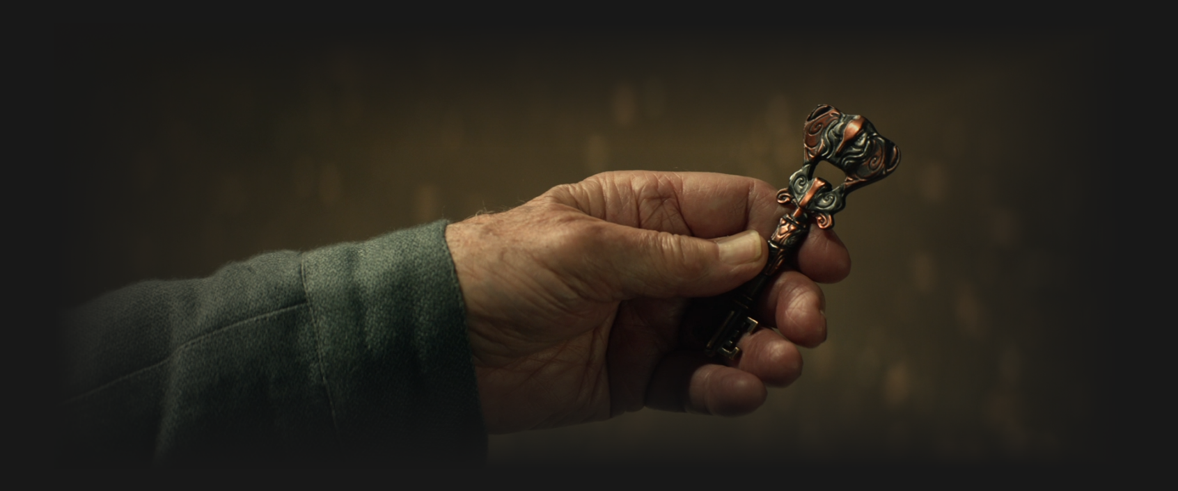 A close-up of an intricately-designed ward key