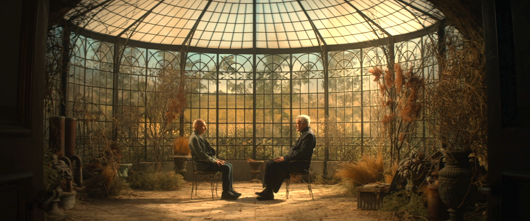 Picard and Q having a conversation while sitting in the solarium