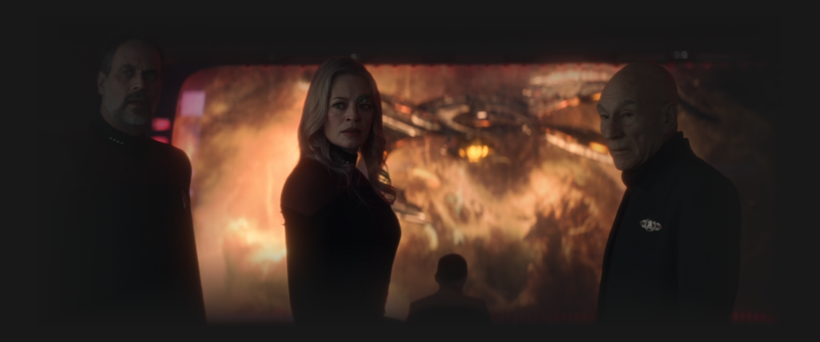 Shaw, Seven, and Picard looking concerned as the Shrike approaches on the viewscreen behind them