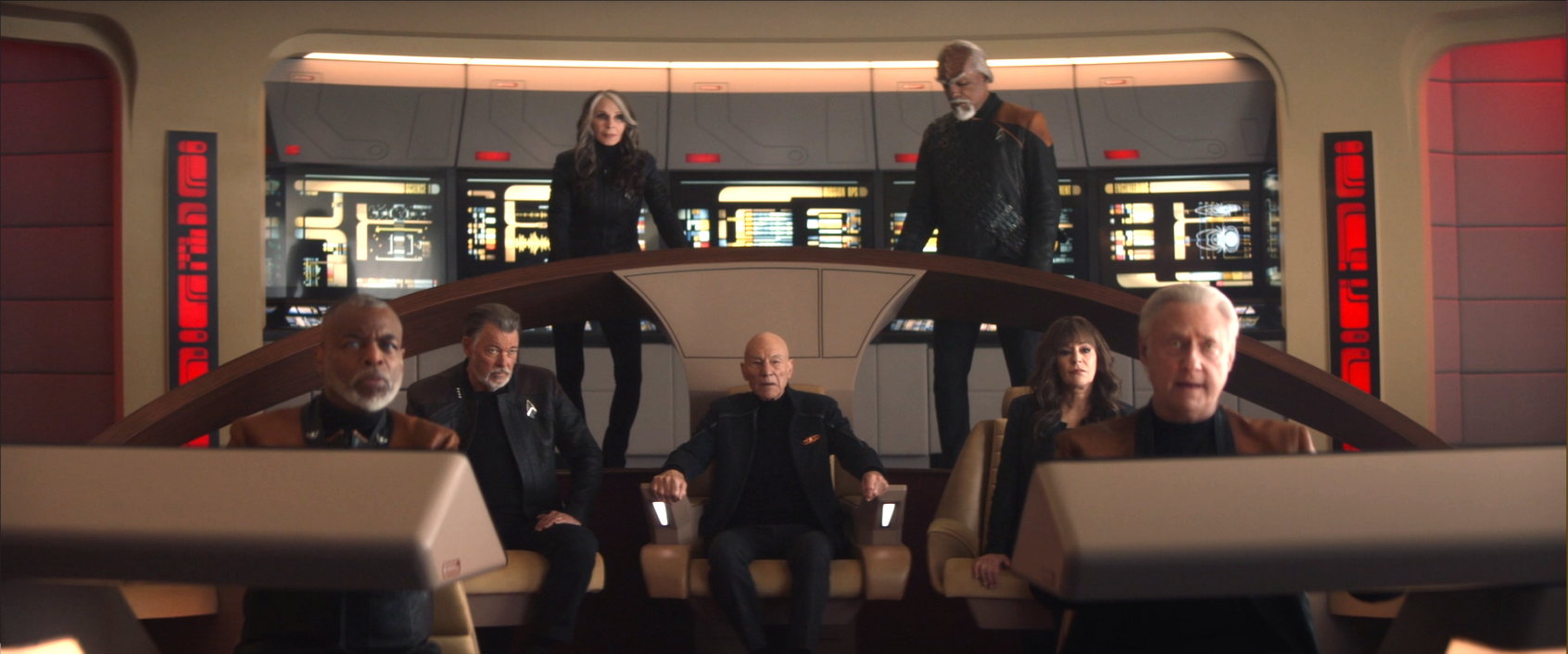 Crusher, Worf, La Forge, Riker, Picard, Troi, and Data, all on the Enterprise-D bridge