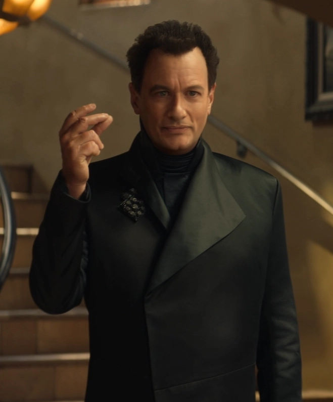 A younger-looking Q about to snap his fingers