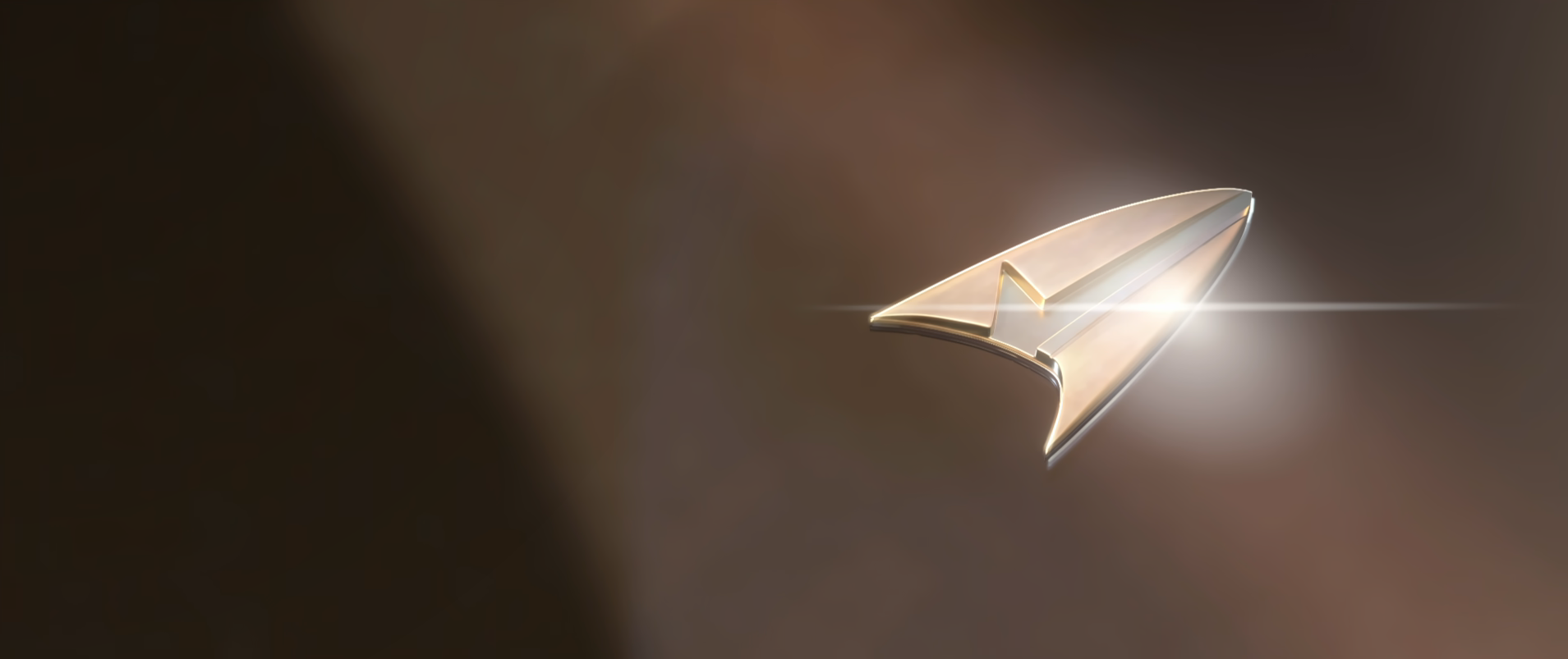 A combadge from the Protostar with a glint of light reflecting off of it