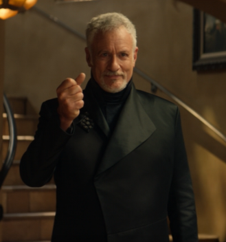 Q, appearing to have aged