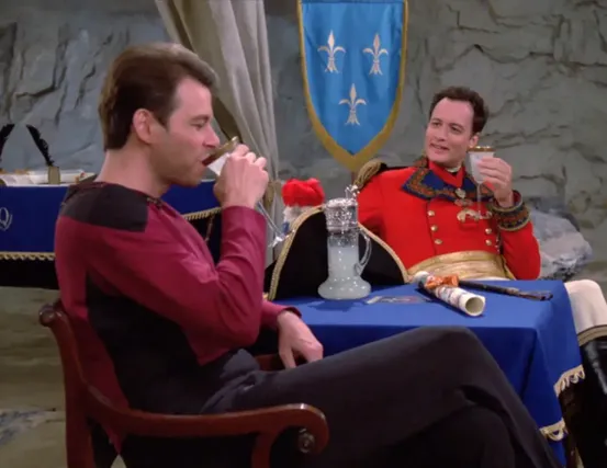 Q and Riker enjoying a glass of lemonade