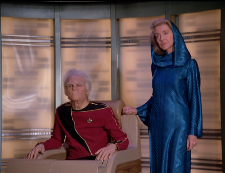 An elderly wheelchair-bound Admiral and his wife