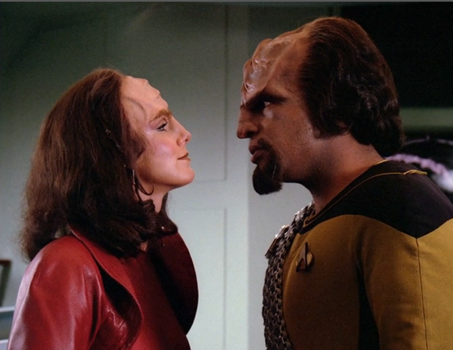 Worf and K'Ehleyr speaking face-to-face