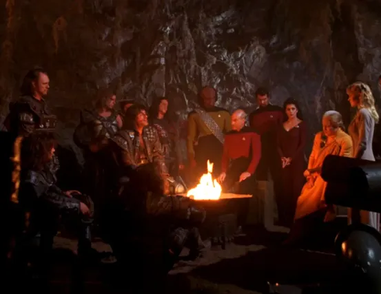 Picard and a delegation from the Enterprise mediating peace talks between the Acamarians and the Gatherers