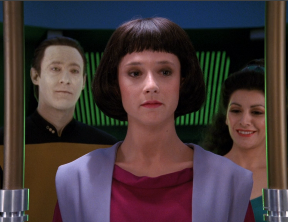 Data and Troi smiling at Data's new android daughter