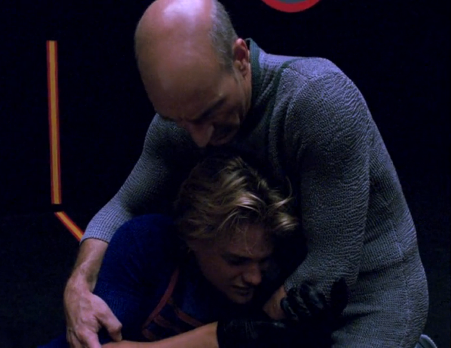 Picard holding a weeping Jono