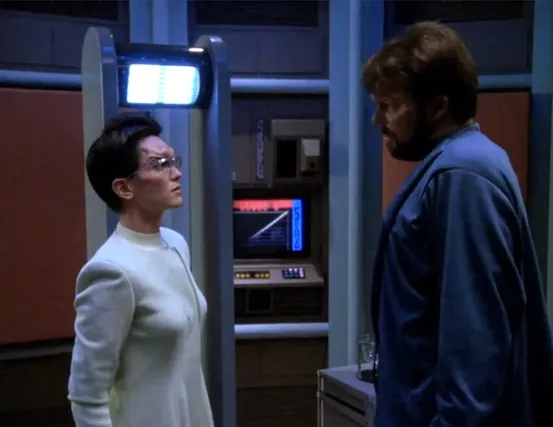 Riker and an alien female doctor
