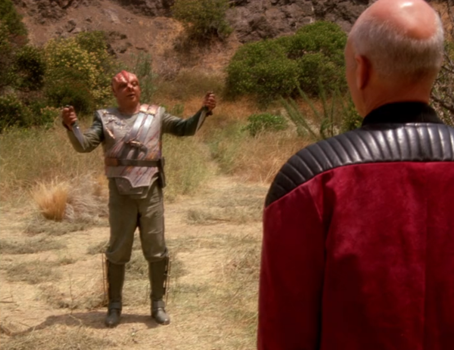 Picard and the Tamarian captain attempting to communicate