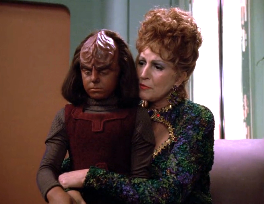 Lwaxana Troi talking to Alexander while he's sitting on her lap