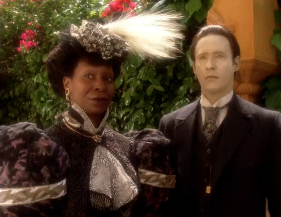 Guinan and Data wearing fancy 19th-century clothing