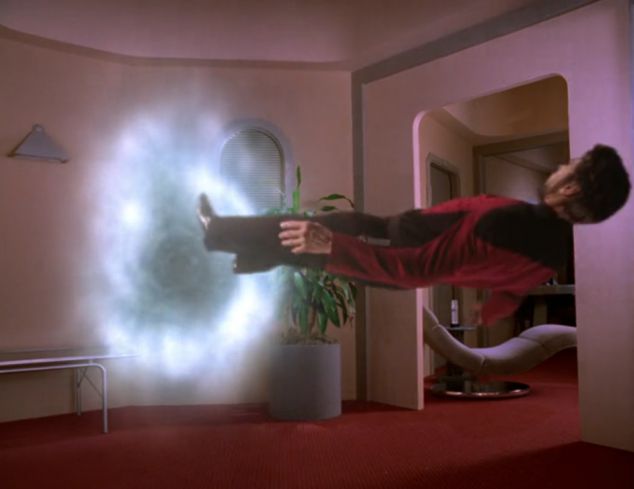 Riker floating horizontally into a vortex of some sort