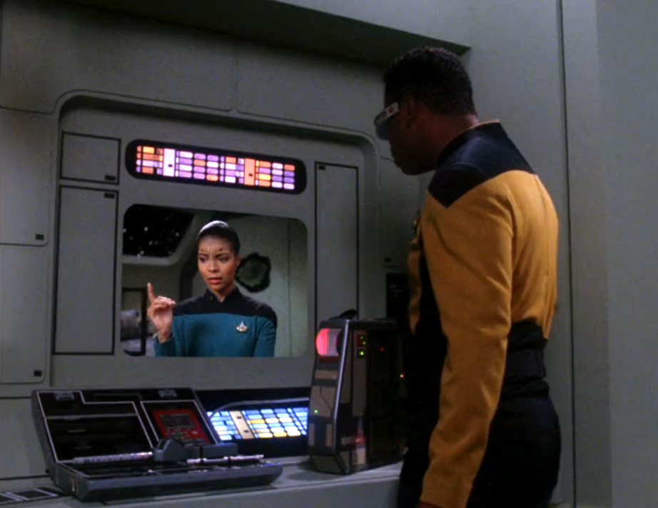 La Forge watching Aquiel's personal logs