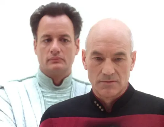Picard and Q in an empty, white void