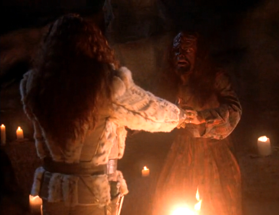 Kahless calling Worf to him over a fire in a cavern