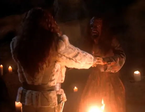 Kahless calling Worf to him over a fire in a cavern