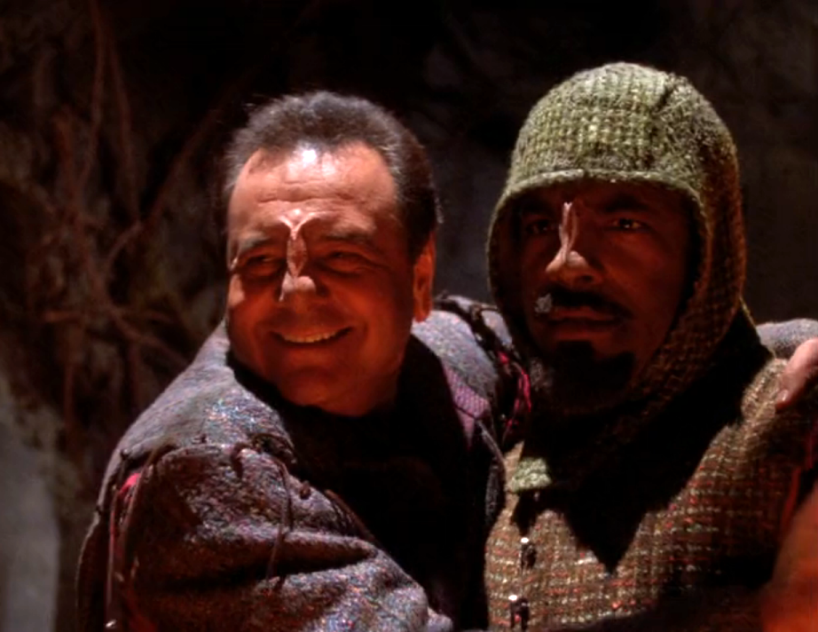 Worf, undercover in plainclothes, being greeted by his foster brother