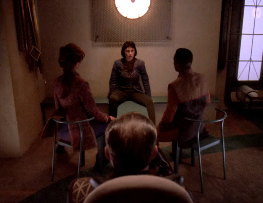 Ro Laren being interrogated by three members of the Maquis
